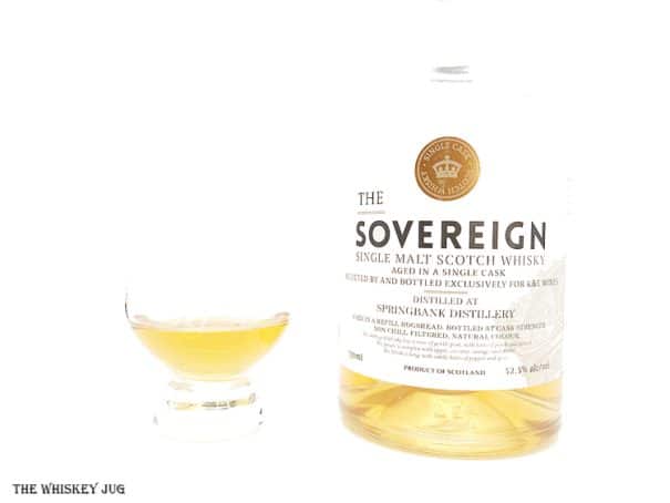 White background tasting shot with the 1995 Sovereign Springbank 22 Years bottle and a glass of whiskey next to it.